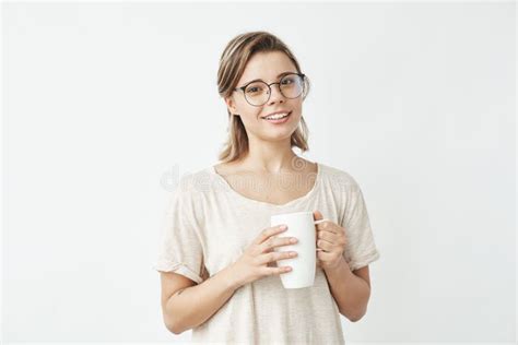 Cute Beautiful Natural Brunette Girl Cleaning Face With Cotton Sponge Smiling Looking At Camera