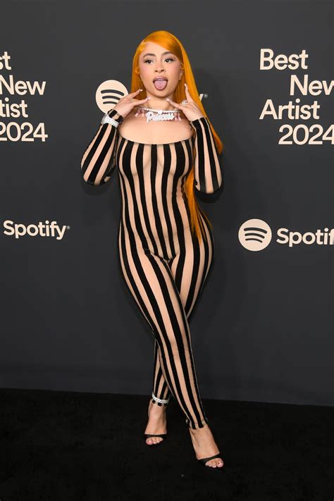 Ice Spice Puts A Hot Spin On Beetlejuice In A Striped See Through Catsuit