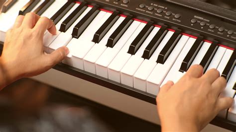 Close Up Of Young Womans Hand Playing The Piano Happy Asian Woman