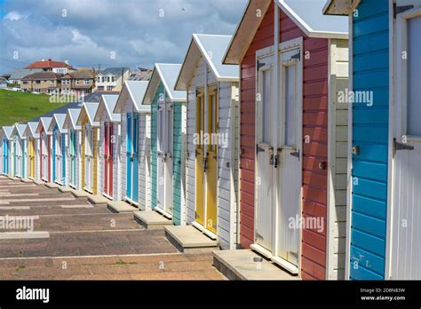 Multi Coloured Beach Huts Facing The Beach At Bude Cornwall Uk July 6