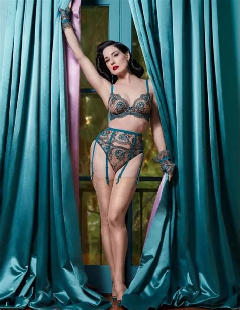 Dita Von Teese Shows Off Her Incredible Figure As She Models Racy Lace Lingerie From Her New