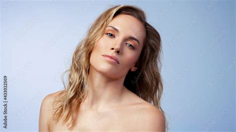 Beautiful Blonde With Wavy Hair Close Up Skin Care Nude Makeup Stock Photo Adobe Stock