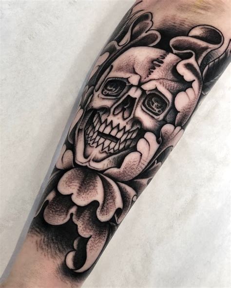 Black and Grey Skull Tattoos - Cloak and Dagger Tattoo London