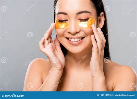 Naked Asian Woman With Eye Patches On Face On Grey Stock Image Image Of Wellness Pampering