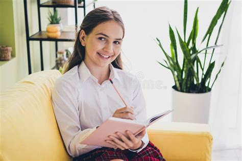 Photo Portrait Of Cute Adorable Teen Girl Sit Couch Write Notebook Wear