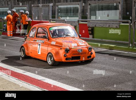 Italian Bicilindriche Cup Orange Fiat 500 Racing Car Moving From Pit