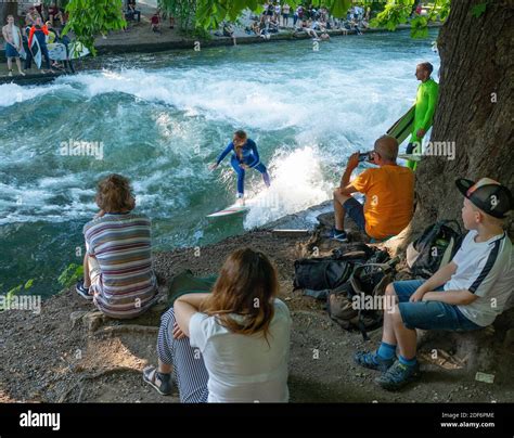 River Surfing At The Eisbach In Munich Bavaria Germany The Eisbach