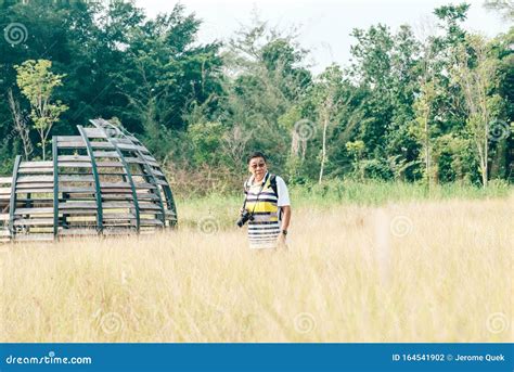 Chinese Mature Woman In Park Royalty Free Stock Photography CartoonDealer 32331557