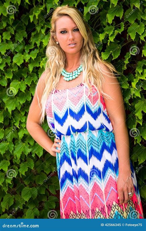 Blonde Woman In Casual Fashion On Ivy Wall Stock Image Image Of Blonde Breasts 42566345