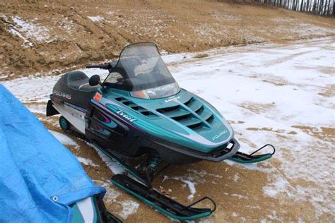 1997 Polaris Indy Trail Snowmobile Lee Real Estate Auction Service