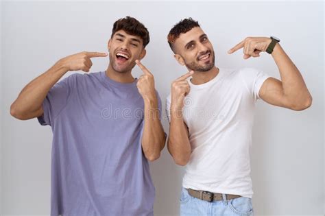Homosexual Gay Couple Standing Over White Background Smiling Cheerful
