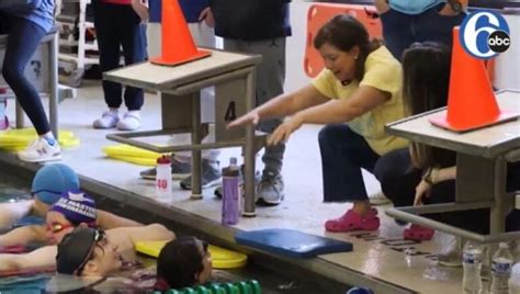 Teen Swimmers Volunteer To Help Special Olympics Swim Team