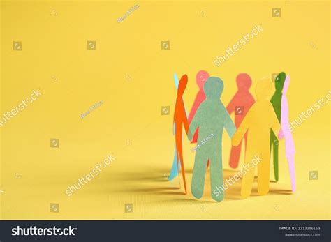 paper human figures standing stock photo