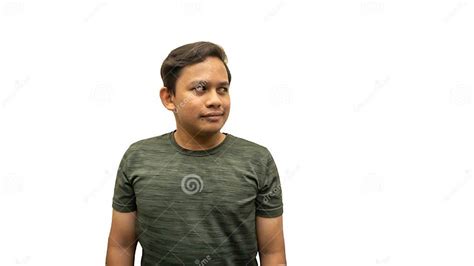 Smiling Face Expression Of Young Asian Malay Man Looking At Empty Space