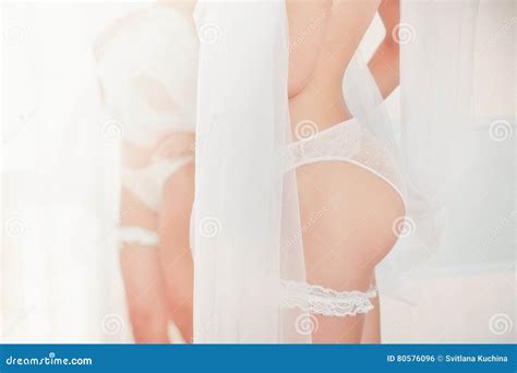 Beautiful Nude Bride With Veil In White Erotic Lingerie Stock Photo