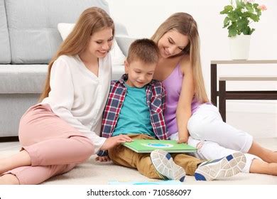 Lesbian Couple Reading Foster Son Home Stock Photo Shutterstock