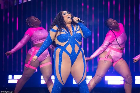 Lizzo Flaunts Her Curves In A Sparkly Blue Nude Illusion Jumpsuit On Tour In Florida Daily