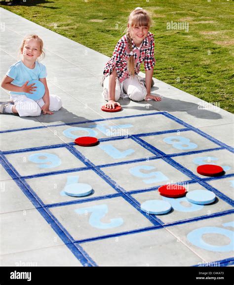 Children Playing In Hopscotch Kids Outdoor Games Stock Photo Alamy