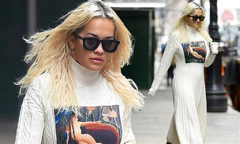 Rita Ora Looks Chic In A Sweater Dress Featuring A Picture Of A Naked Lady In Nyc Daily Mail