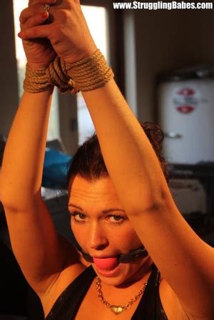 Brunette Chick With A Gagball Dangling On A Rope Gets To XXX Dessert