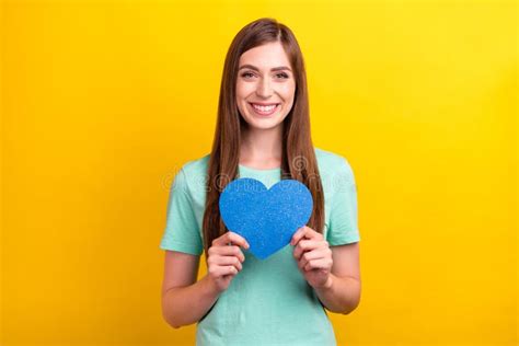 Photo Of Cute Brunette Hairdo Millennial Lady Hold Heart Wear Teal T