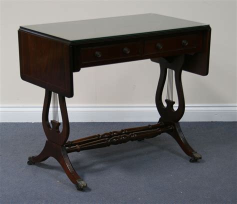 A 20th Century Reproduction Mahogany Sofa Table Fitted With Two Frieze