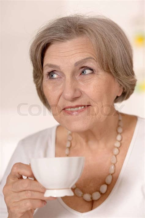 Older Woman Drinking Tea Stock Image Colourbox