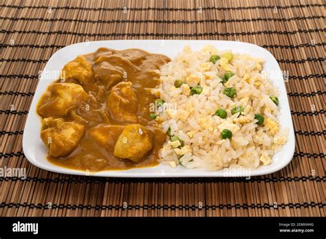 Chicken curry with egg and fried rice Stock Photo - Alamy