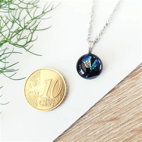 Le Pendentif En Verre Touches De Bleues Argent Es L Crin Naturel