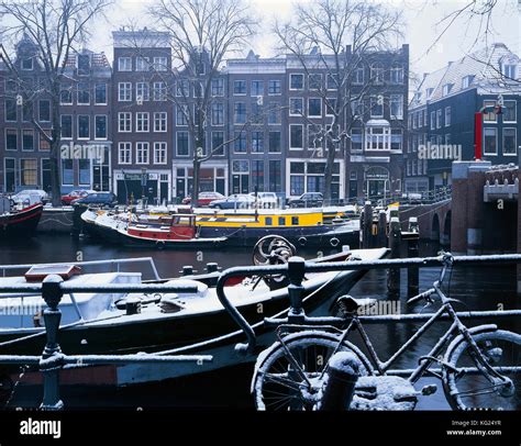 A wintery canal Amsterdam, Noord-Holland, Netherlands *** Local Caption ...