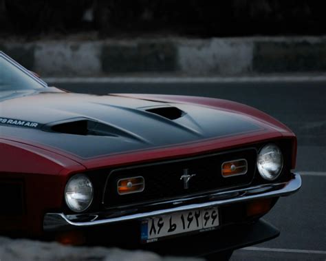 red  black bmw   photo  tehran image  unsplash