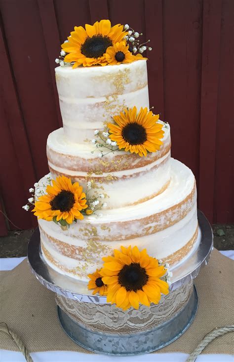 Naked Cake With Sunflowers And Gold Foil Accents For A Ranch Wedding