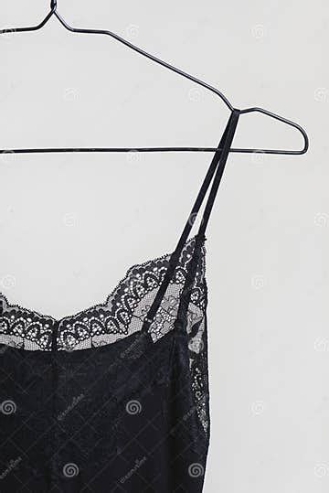 Stylish Lingerie Black Nightie Hanging On A Hanger Set Of Female