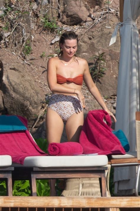 Margot Robbie On The Beach Hides Her Fat Ass Under A Retro Swimsuit The Fappening