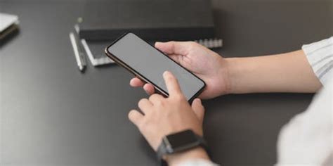 person holding  cellular phone  stock photo