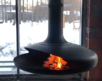 Подвесные камины для дома дровяные: купить в Москве для загородного ...