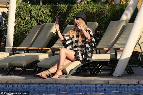 Sarah Harding Shows Off Her Figure In Skimpy Orange Embellished Bikini Daily Mail Online