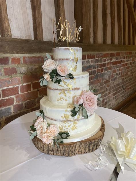 Large Tier Semi Naked Wedding Cake With Gold Leaf Detail