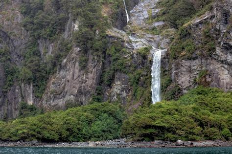 Premium Photo | Waterfall at milford sound