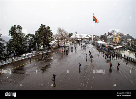 beautiful view of shimla city and mall road after snowfall Stock Photo - Alamy