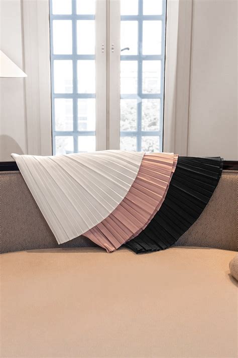 SEVYN PLEATED CURVED HEM SKORTS NUDE PINK Lovet