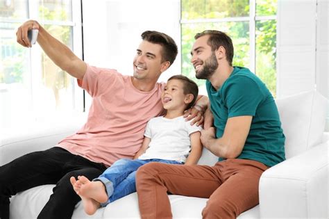 Premium Photo Male Gay Couple With Foster Son Taking Selfie Adoption Concept