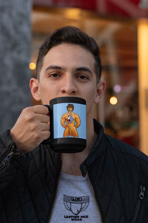 Jock Mug Swim MEAT A Nude Cartoon Of A Muscle Jock With USA Flag Swim Trunks In His Mouth