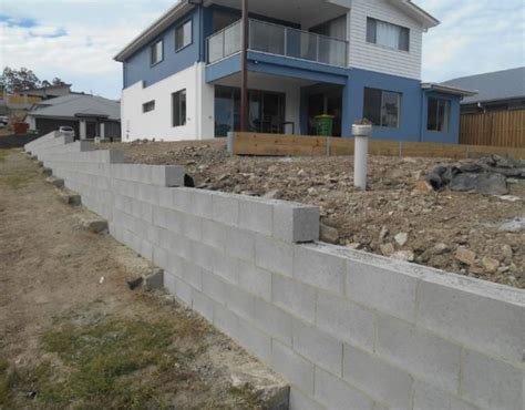 besser block wall installation matching home aesthetics  gold coast