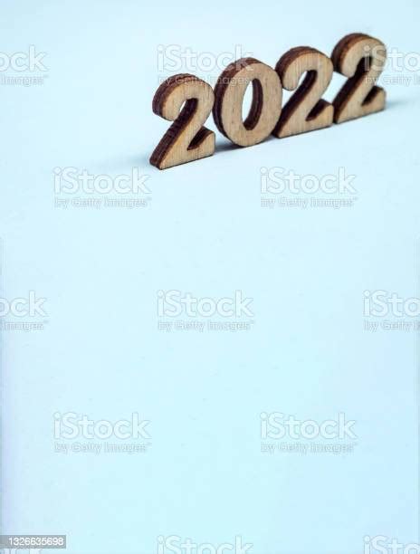 Numerals 2022 On Blue Background Wooden Digits 2022 Stock Photo
