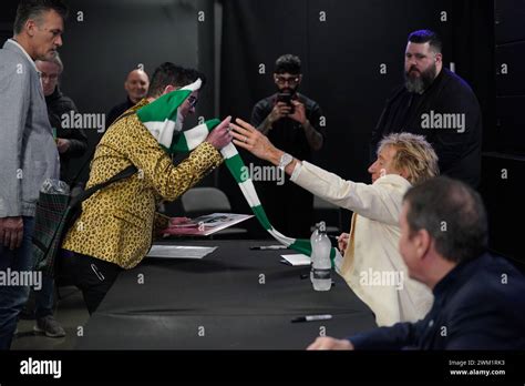 Rod Stewart 2nd Right And Jools Holland Right During A Signing