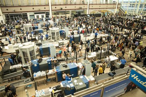 Long security lines at DIA are the new norm. Here's how to plan around them