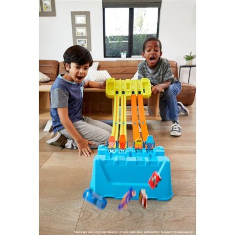 Ігровий набір контейнер Грандіозні трюки Hot Wheels GLC