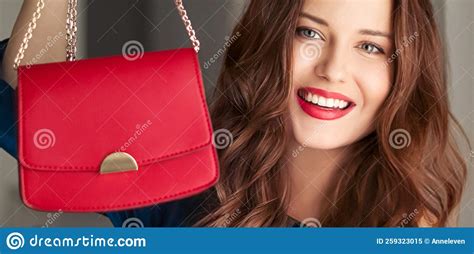 Fashion And Accessories Happy Beautiful Woman Holding Small Red Handbag With Golden Details As