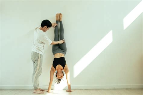 The Top 7 Reasons to Attempt a Handstand - Flying Yogis